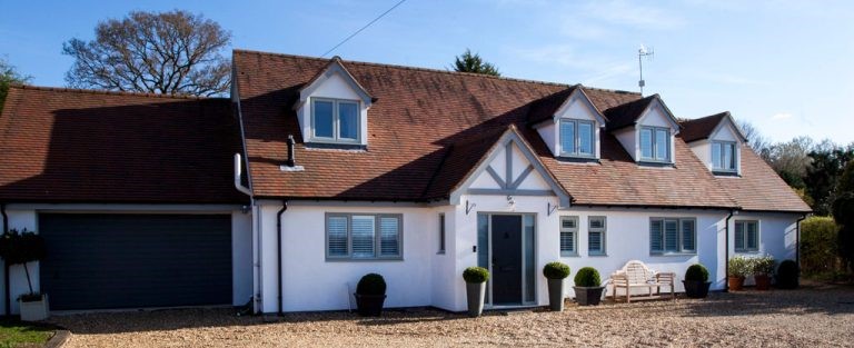 House exterior with casement windows